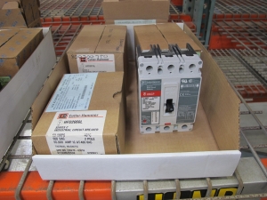 MISC. SQUARE-D AND CUTLER HAMMER MOTOR CIRCUIT PROTECTORS WITH ROLLS OF REFLECTIVE TARP. LOADING & HANDLING $5-1471