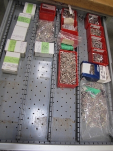 LOT TO INCLUDE: BUTCHER BLOCK TABLE TOP 63"L X 30"W, (2) LISTA 7 DRAWER CABINET WITH MISC. ELECTRICAL CONTENTS. LOADING & HANDLING $15-1711