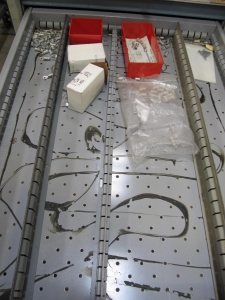 LOT TO INCLUDE: BUTCHER BLOCK TABLE TOP 63"L X 30"W, (2) LISTA 7 DRAWER CABINET WITH MISC. ELECTRICAL CONTENTS. LOADING & HANDLING $15-1711