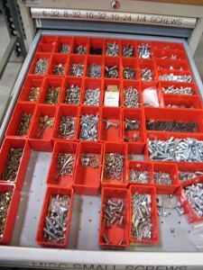 LOT TO INCLUDE: BUTCHER BLOCK TABLE TOP 72"L X 30"W, (2) LISTA 7 DRAWER CABINET WITH MISC. BOLTS, NUTS, SCREWS, AND FITTINGS. LOADING & HANDLING $15-1712