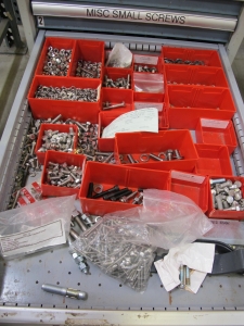 LOT TO INCLUDE: BUTCHER BLOCK TABLE TOP 72"L X 30"W, (2) LISTA 7 DRAWER CABINET WITH MISC. BOLTS, NUTS, SCREWS, AND FITTINGS. LOADING & HANDLING $15-1712