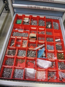 LOT TO INCLUDE: BUTCHER BLOCK TABLE TOP 72"L X 30"W, (2) LISTA 7 DRAWER CABINET WITH MISC. BOLTS, NUTS, SCREWS, AND FITTINGS. LOADING & HANDLING $15-1712