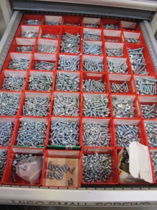 LOT TO INCLUDE: BUTCHER BLOCK TABLE TOP 72"L X 30"W, (2) LISTA 7 DRAWER CABINET WITH MISC. BOLTS, NUTS, SCREWS, AND FITTINGS. LOADING & HANDLING $15-1712