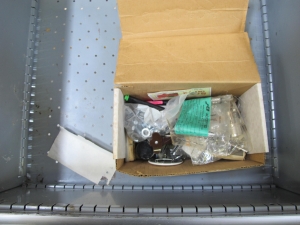 LISTA INDUSTRIAL WORK DESK, BUTCHER BLOCK TABLE TOP 60"L X 30"W, 5 DRAWER CABINET WITH CONTENTS TO INCLUDE: MISC. ITEMS. LOADING & HANDLING $15-1672