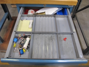 LISTA INDUSTRIAL WORK DESK, BUTCHER BLOCK TABLE TOP SHELF 48"L X 30"W, 4 DRAWER CABINET WITH CONTENTS TO INCLUDE: MISC. TEST CABLES AND WIRE, WIRE BRUSHES. LOADING & HANDLING $15-1673