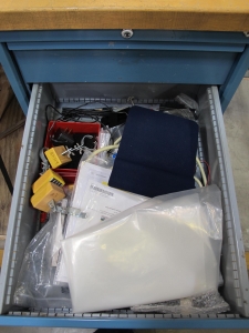 LISTA INDUSTRIAL WORK DESK, BUTCHER BLOCK TABLE TOP 48"L X 30"W, 4 DRAWER CABINET WITH CONTENTS TO INCLUDE: ELECTRIC CONNECTORS, CABLES, TEST WIRING . LOADING & HANDLING $15-1674