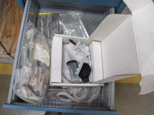 LISTA INDUSTRIAL WORK DESK, BUTCHER BLOCK TABLE TOP 48"L X 30"W, 4 DRAWER CABINET WITH CONTENTS TO INCLUDE: ELECTRIC CONNECTORS, CABLES, TEST WIRING . LOADING & HANDLING $15-1674