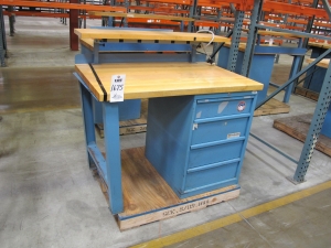 LISTA INDUSTRIAL WORK DESK, BUTCHER BLOCK TABLE TOP 48"L X 30"W, SHELF, 4 DRAWER CABINET WITH CONTENTS TO INCLUDE: MISC. OFFICE SUPPLIES, CABLES, AND EAR MUFFS. LOADING & HANDLING $15-1675