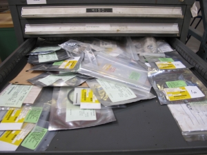 STANLEY VIDMAR 13 DRAWER CABINET WITH CONTENTS TO INCLUDE: PUMP FILTERS, GASKETS, BRASS ITEMS, PLUNGER. LOADING & HANDLING $15-1684