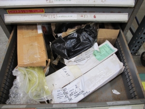 STANLEY VIDMAR 13 DRAWER CABINET WITH CONTENTS TO INCLUDE: PUMP FILTERS, GASKETS, BRASS ITEMS, PLUNGER. LOADING & HANDLING $15-1684