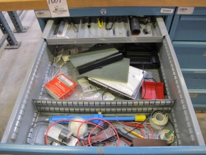 LOT TO INCLUDE: BUTCHER BLOCK TABLE TOP 72"L X 30"W, (2) LISTA 4 DRAWER CABINETS WITH CONTENTS TO INCLUDE: MISC. ELECTRIC CONNECTORS, ELECTRIC TESTING EQUIPMENT, OFFICE SUPPLIES. LOADING & HANDLING $15-1689