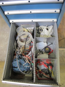 LISTA INDUSTRIAL WORK DESK, BUTCHER BLOCK TABLE TOP 60"L X 30"W, 5 DRAWER CABINET WITH CONTENTS TO INCLUDE: MISC. ELECTRICAL TAPE, ELECTRICAL TESTING WIRE AND TIPS, BRASS AND STEEL FITTINGS. LOADING & HANDLING $15-1690