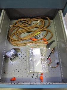 LISTA INDUSTRIAL WORK DESK, BUTCHER BLOCK TABLE TOP 48"L X 30"W, SHELF, 4 DRAWER CABINET WITH CONTENTS TO INCLUDE: FITTINGS, MISC. OFFICE SUPPLIES, WIRING. LOADING & HANDLING $15-1695