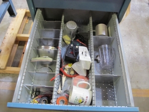 LISTA INDUSTRIAL WORK DESK, BUTCHER BLOCK TABLE TOP 48"L X 30"W, 4 DRAWER CABINET WITH CONTENTS TO INCLUDE: EAR PLUGS, MISC. OFFICE SUPPLIES, TEST WIRING, TUBING. LOADING & HANDLING $15-1699