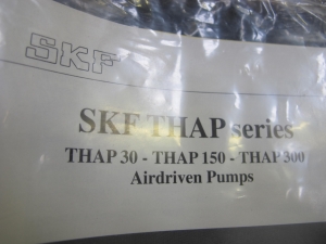 (NEW! STILL IN PLASTIC) SKF THAP 300 AIRDRIVEN PUMP, WITH INSTRUCTION BOOKLET, SKF OIL, AND STEEL CASE-2153