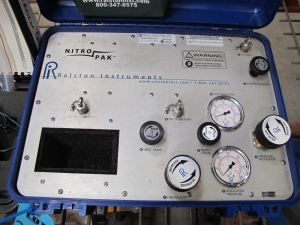 LOT TO INCLUDE: (1) ACS HYDRAULICS SERVO ANALYZER, WITH POWER SUPPLY, TEST CABLE, INSTRUCTION BOOKLET, AND PORTABLE CASE, (1) RALSTON INSTRUMENTS NITROPAK, MODEL NUMBER NPAK-0000-0-0, WITH ACCESSORY BAG-2158