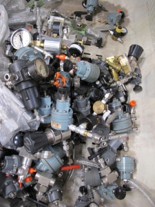PALLETAINER LOT TO INCLUDE: LARGE QUANTITY OF SIEMENS, NULLMATIC, FAIRCHILD, TESCOM, EST, AND FISHER PRESSURE REGULATORS, GAUGES, AND FITTINGS,  SS BRAIDED FLEX PIPING-2169