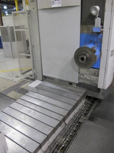 2003 SNK IKEGAI TABLE TYPE HORIZONTAL BORING MILL, NB 130P E3.5, 5.118" SPINDLE DIAMETER, TRAVELS: X-137", Y-98", Z-63", W-27.5", TABLE SIZE: 70.86" X 63", ROTARY TABLE CAPACITY: 22.045 LBS, 2,500 RPM SPINDLE SPEED, CAT 50 TAPER SPINDLE, COOLANT THRU SPINDLE, RIGID TAPPING, 35 HP, 60 ATC, COOL POWER, FANUC 16iMB CNC CONTROL, 5 AXIS SIMULTANEOUS CONTROL, STEEL WAY COVERS, CHIP CONVEYOR, S/N NB4002 (G-49) LOADING & HANDLING FEE $17,500-2188