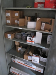 CONTENTS OF 8'X8'X20' STORAGE CONTAINER: TO INCLUDE PAINTING FINISHING AND SANDBLASTING SUPPLIES: VACUUM DISCS, GRINDING WHEELS, TAPE, CLEMCO CARTRIDGES, SPARE PARTS, SAFETY GLOVES, RESPIRATORS, SAND BLASTING MASKS, CHLORIDE ION FIELD TEST KITS, PLUS SO MUCH MORE (G-40/#11) (TO BE PURCHASED ONLY BY AN INSURED BUYER, TO BE LOADED BY HAND. NO FORKLIFT USE ALLOWED.)-4415