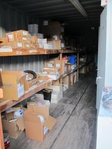 CONTENTS OF 8'X8'X20' STORAGE CONTAINER: TO INCLUDE PAINTING FINISHING AND SANDBLASTING SUPPLIES: VACUUM DISCS, GRINDING WHEELS, TAPE, CLEMCO CARTRIDGES, SPARE PARTS, SAFETY GLOVES, RESPIRATORS, SAND BLASTING MASKS, CHLORIDE ION FIELD TEST KITS, PLUS SO MUCH MORE (G-40/#11) (TO BE PURCHASED ONLY BY AN INSURED BUYER, TO BE LOADED BY HAND. NO FORKLIFT USE ALLOWED.)-4415